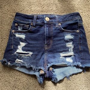 Hi-rise, dark blue American eagle shorts.